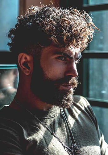 Curly Hair with Beard - rapper / artist beard style