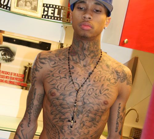 Tyga's All Tatted Chest - musical tattoo styles